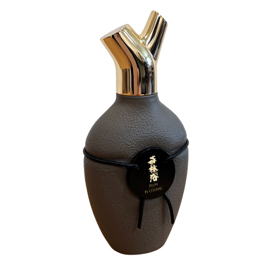 Scents of Wood Plum in Cognac Vintage 2024 perfume bottle